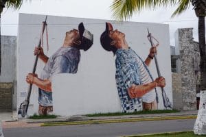 Seawalls mural featuring Cozumel fishermen.