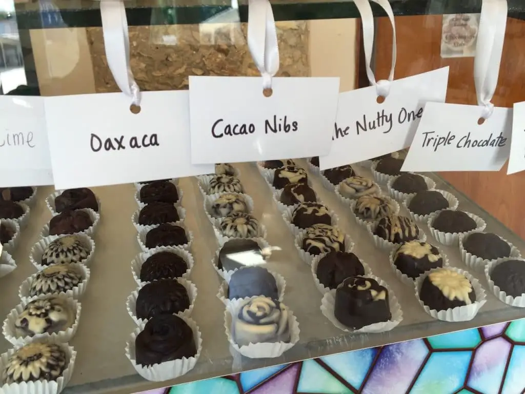 Array of assorted handmade chocolate truffles from Cozumel craft shop.