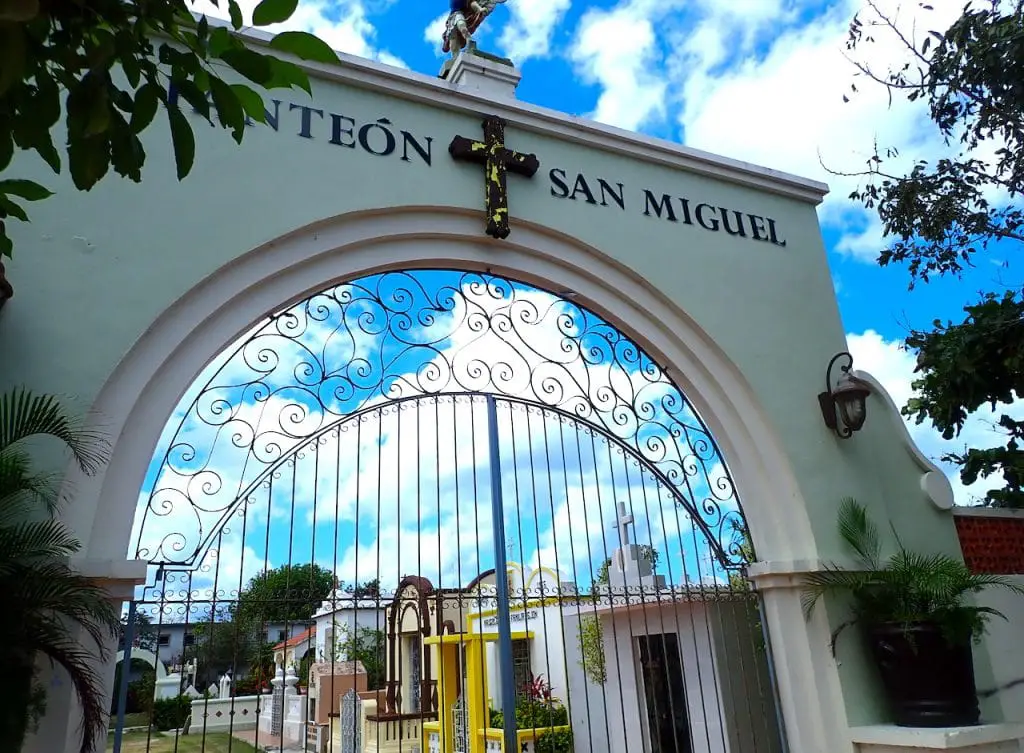 Pretty cemetary entrance gate and sunny sky at Cemetary Panteon San Miguel in Cozumel Mexico.