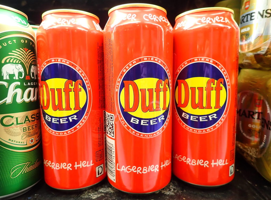 6-pack of Duff brand beer on Cozumel grocery store shelf.