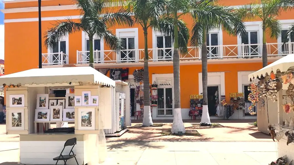 Individual park vendor kiosks with art