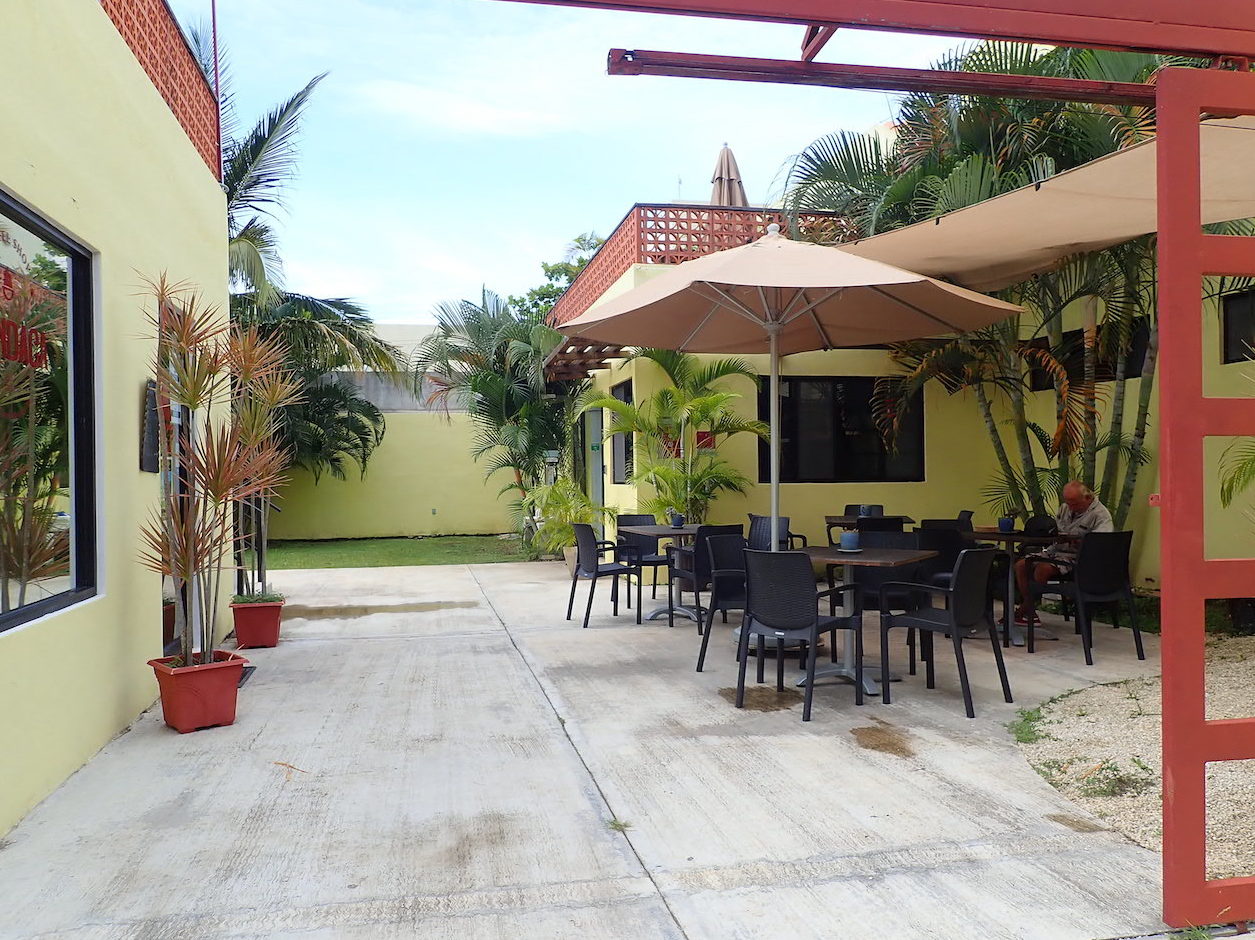 Mundaca coffee bar outdoor courtyard in the Corpus Christi neighborhood of San Miguel de Cozumel.