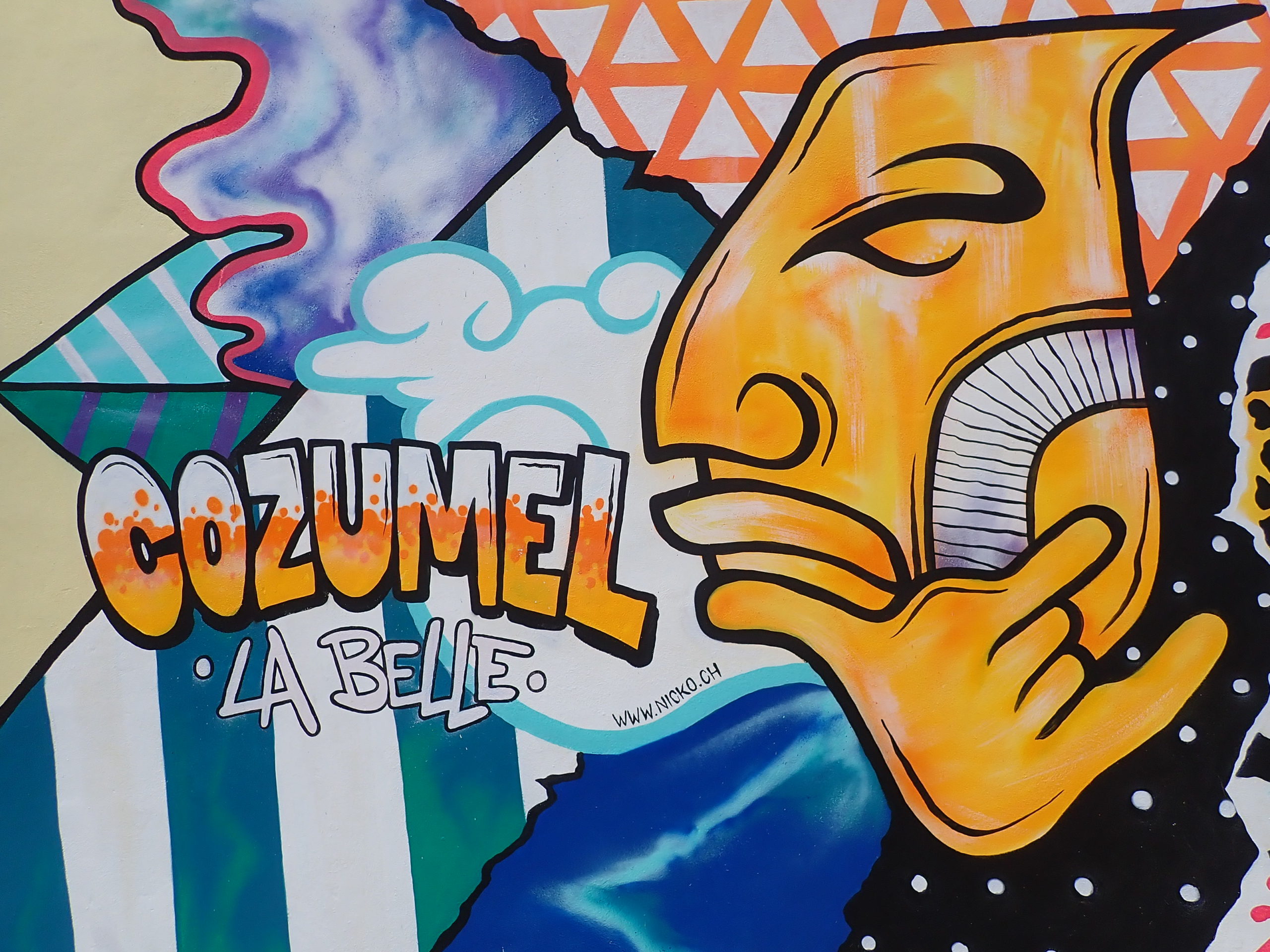 Cozumel mural on side of boutique hotels.