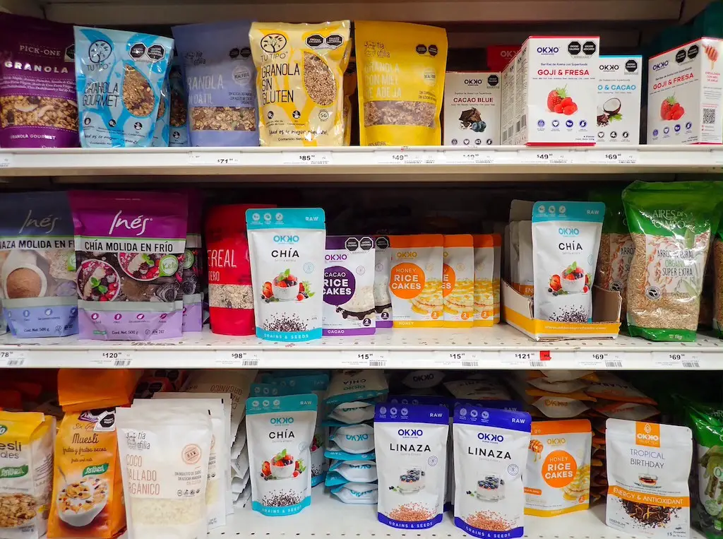 Various healthy and plant-based items in a grocery aisle