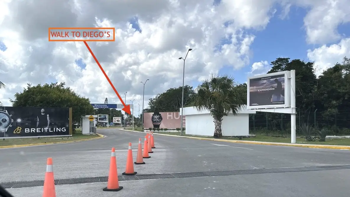 View of the walking distance from the Cozumel airport exit to Diego's Tacos across the main street. 
