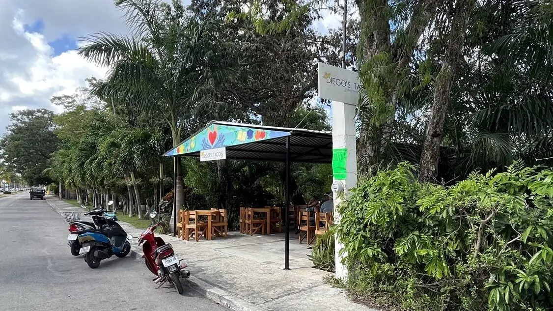 Approaching Diego's tacos in Cozumel across the street from the Cozumel Airport entrance roadway.