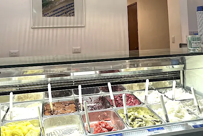 Photo of all the various gelato choices inside an gelato shop in Cozumel, Mexico. Photo by author. 