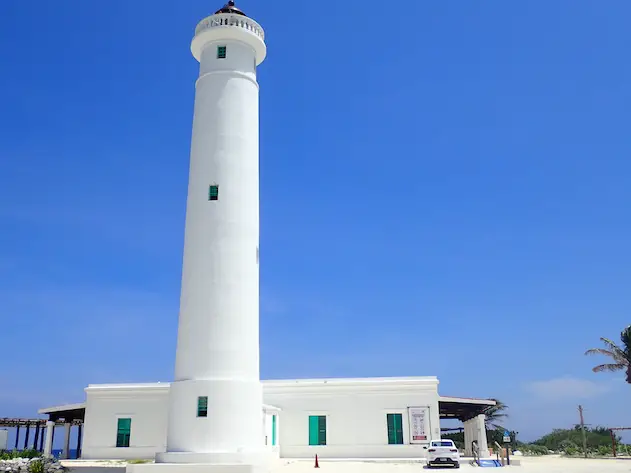 Author's shot of the Punta Sur lighthouse on Cozumel Island in 2023, against a brilliant blue sky background.