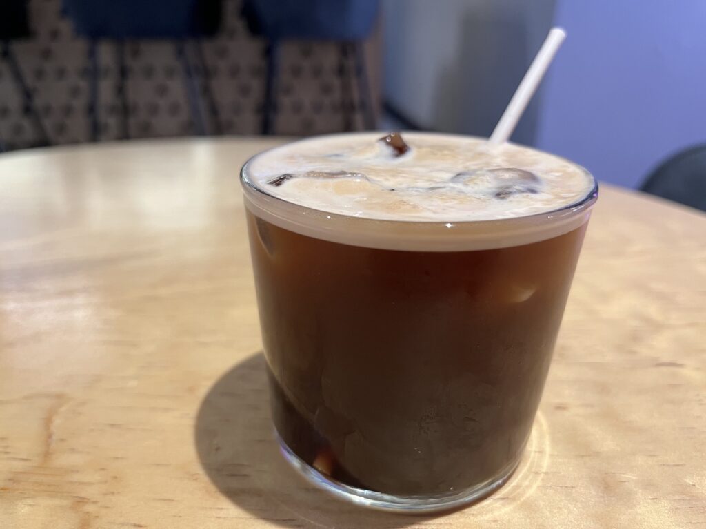 Interesting and delicious cocktail drink made from cold brew coffee and cranberry syrup.